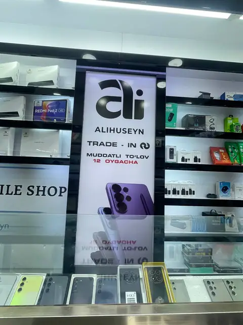 ALIHUSEYN: интерьерные лайтбоксы и брендирование стен магазина телефонов