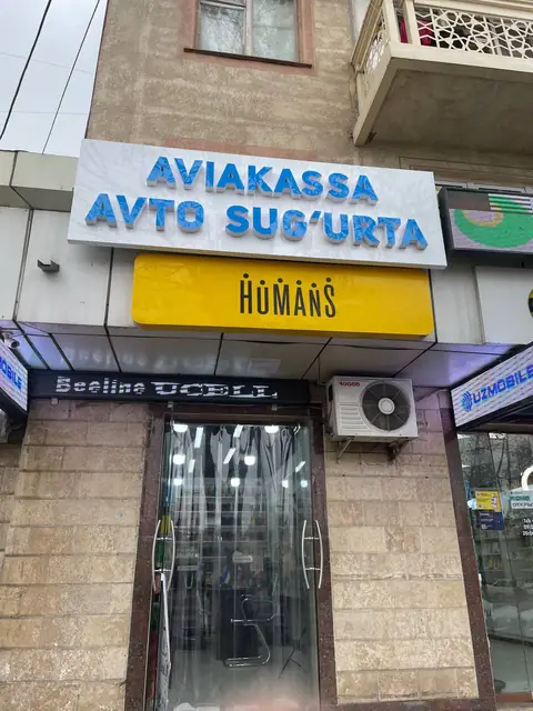 AVIAKASSA AVTO SUG‘URTA: вывеска с объёмными буквами на фасаде