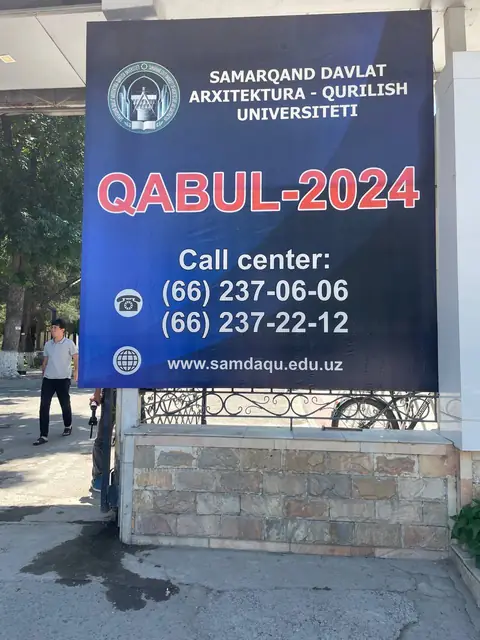 QABUL-2024: рекламный баннер приёмной кампании университета на конструкции