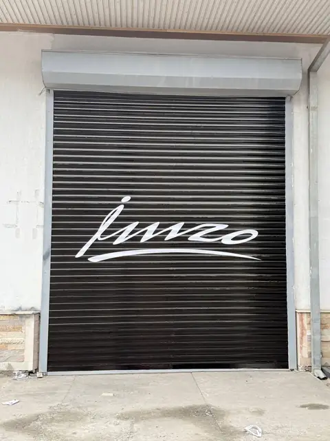 Engelberg · Imzo · Akfa Group: логотипы на рольставнях склада