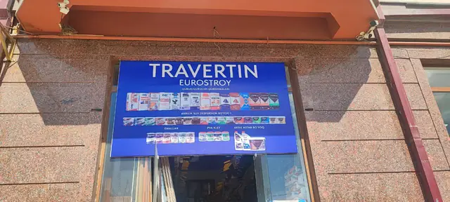 TRAVERTIN EUROSTROY: вывеска-лайтбокс над входом в магазин стройматериалов